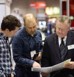 Orgill employee helping customers